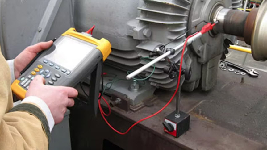 Technician checks bearing currents
